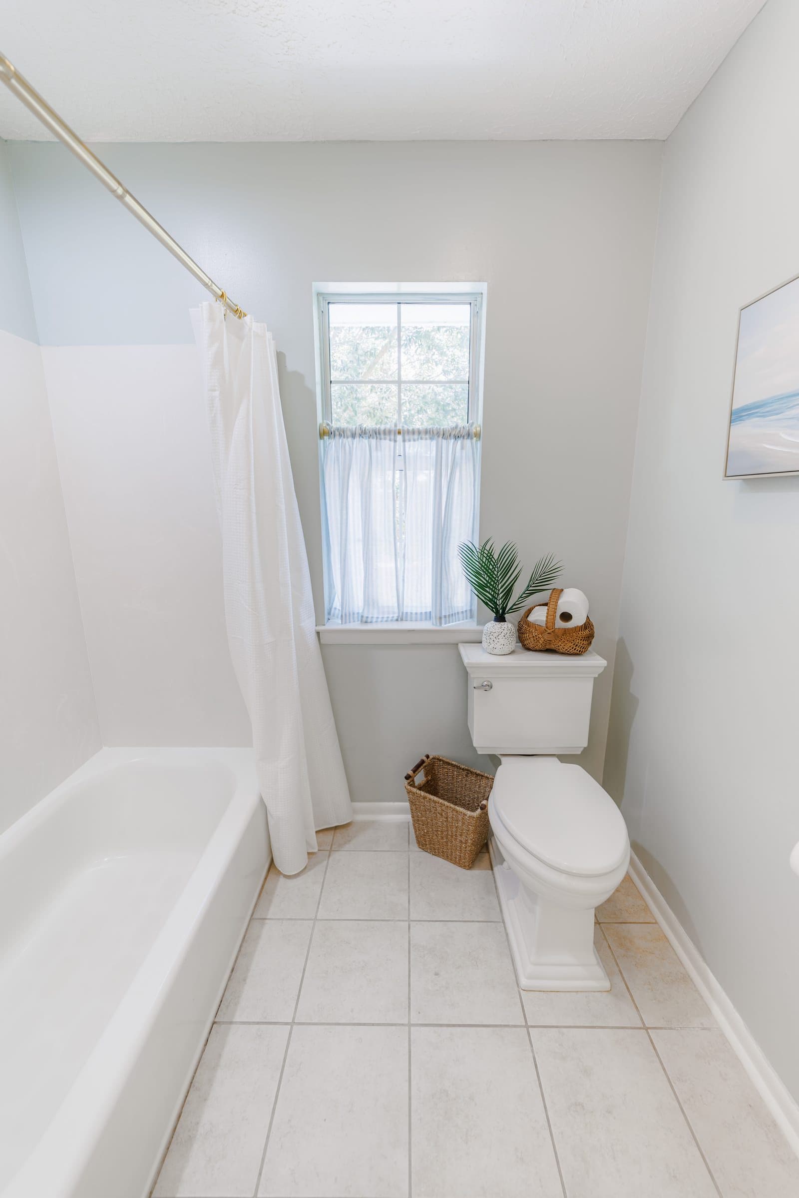 Guest bathroom with tub and shower
