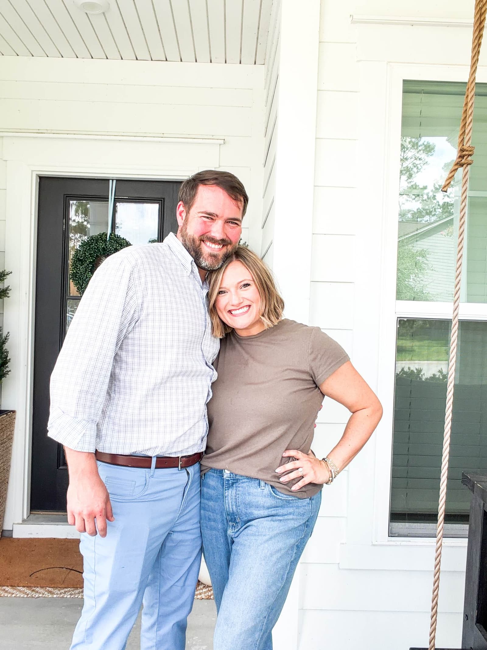 Matthew and Jessica Fowler on the front porch of the retreat